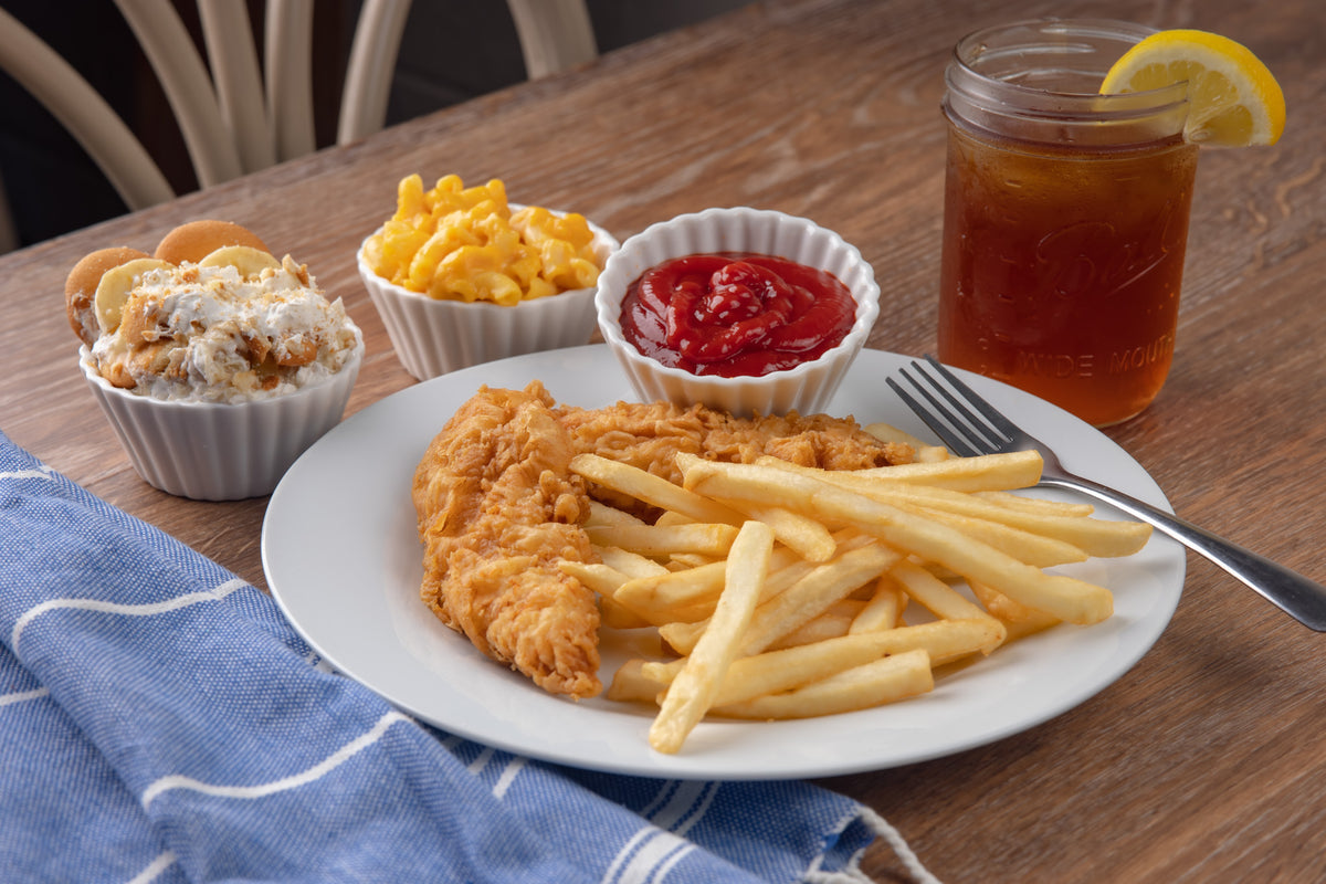 Fried Chicken Tenders and French Fries on Plate