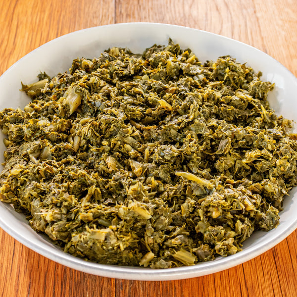 Bowl of Parker's slow-simmered Southern collard greens