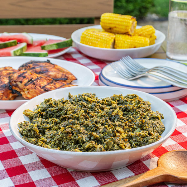 Backyard cookout spread featuring Parker's collard greens